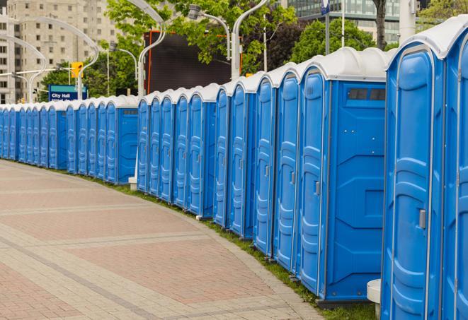 a row of portable restrooms set up for a special event, providing guests with a comfortable and sanitary option in Boulder Creek, CA